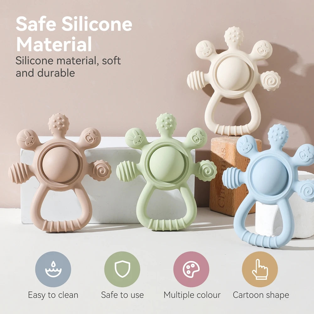 Colorful silicone baby teethers with cartoon shapes in pastel shades, safe and soft material.